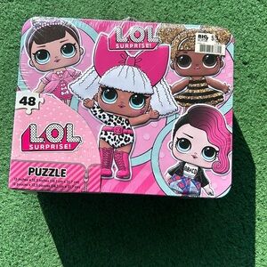 NWT  “L O L surprise” 48 puzzle piece in a lunchbox.  Still wrapped in plastic.